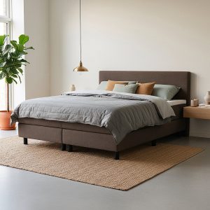 Boxspring bruin in een trendy slaapkamer